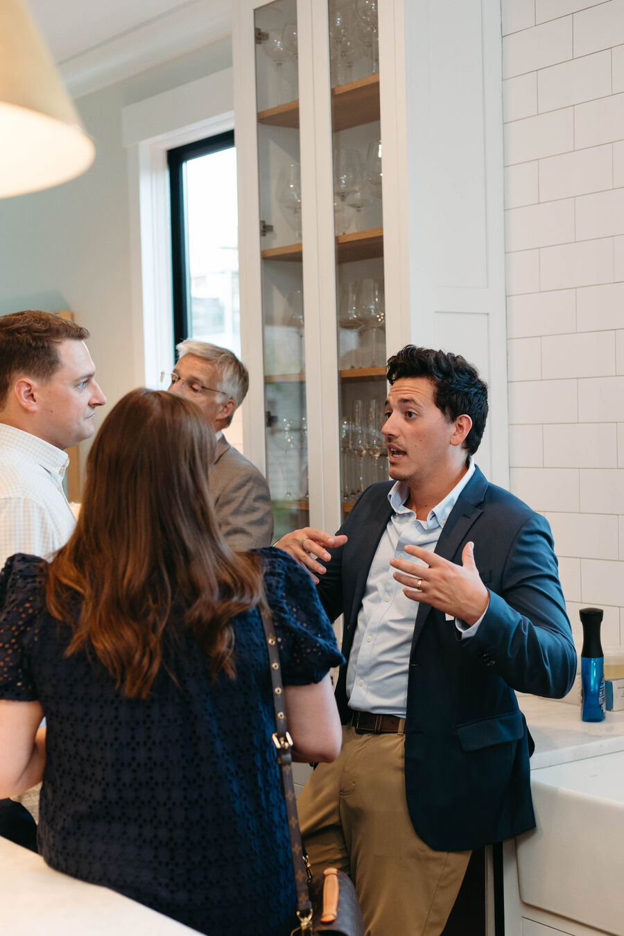 Michael speaking with guests at a donor event